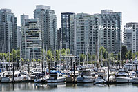 Skyline and boats from the sea wall at Stanley Park, Vancouver, BC