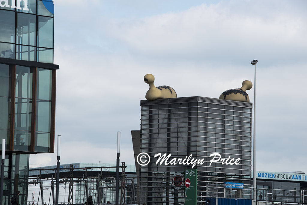 Building whimsy seen on the canal cruise, Amsterdam, Netherlands