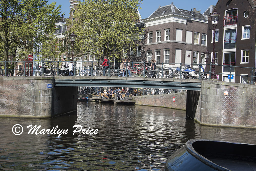 Former warehouses reflected in the windows of other warehouses along Prinsen Gracht, Amsterdam, Netherlands