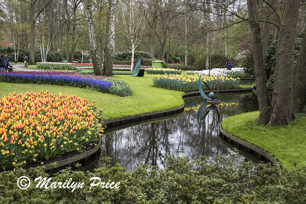 Streams and statues accent the gardens, Keukenhof Gardens, Netherlands