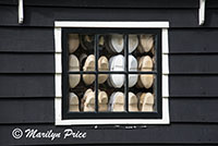 Wooden shoes in a window, Zaandam, Netherlands