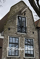 Front of a house with block and tackle, Hoorn, Netherlands