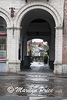 Arched entrance to an outdoor restaurant, Bruges, Belgium