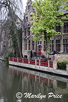 Outdoor restaurant (Bourgognedes Brewery) reflected in a canal, Bruges, Belgium