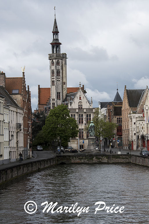 Looking up a canal towards Jan van Eyck square, Bruges, Belgium