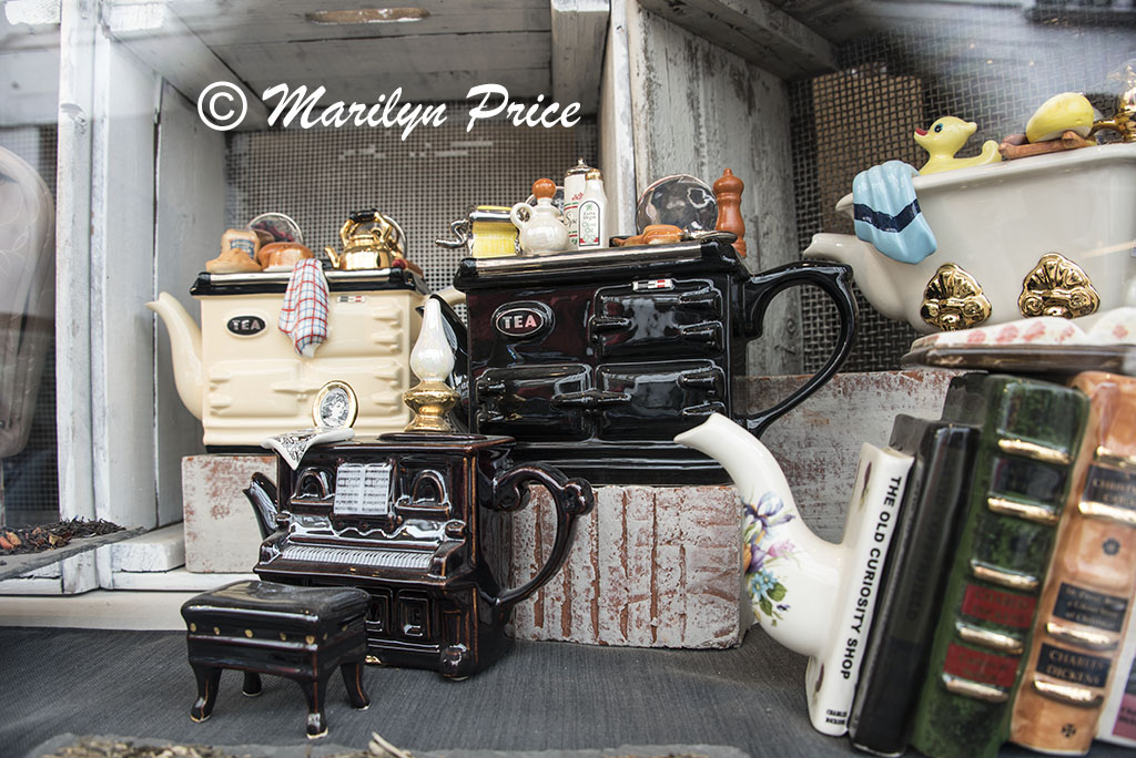 Novelty tea pots in a store window, Bruges, Belgium