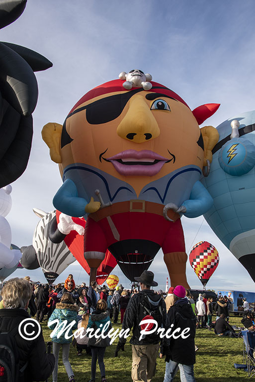 Some of the shape balloons join the others at launch, International Balloon Fiesta, Albuquerque, NM