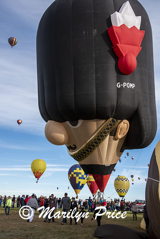Some of the shape balloons join the others at launch, International Balloon Fiesta, Albuquerque, NM