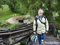 Marilyn climbs the steps to view William Clark's signature on Pompey's Pillar, Pompey's Pillar National Monument, MT