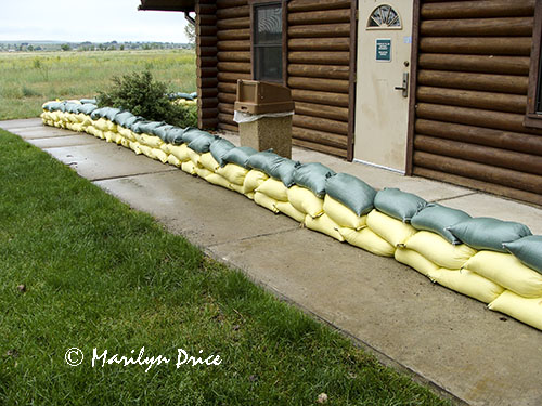 Sandbags protecting the learning center, Pompey's Pillar National Monument, MT