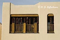 Ristras decorate a balcony, Santa Fe, NM