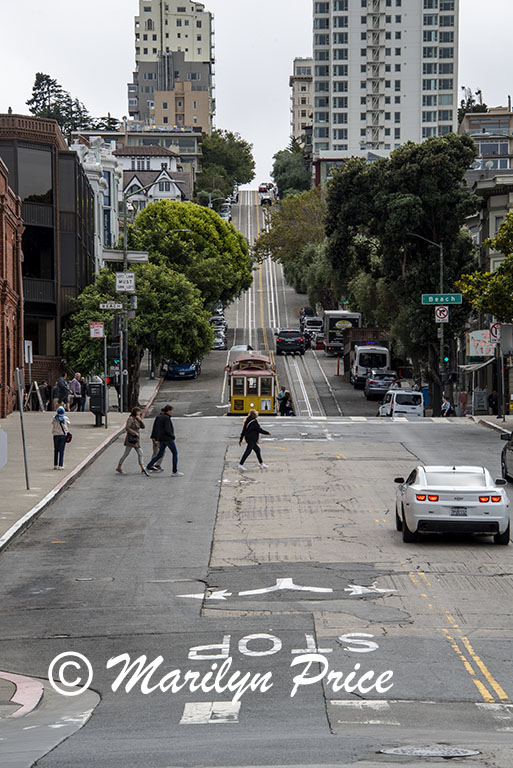 Looking up one of the streets of San Francisco with model cable car, San Francisco, CA