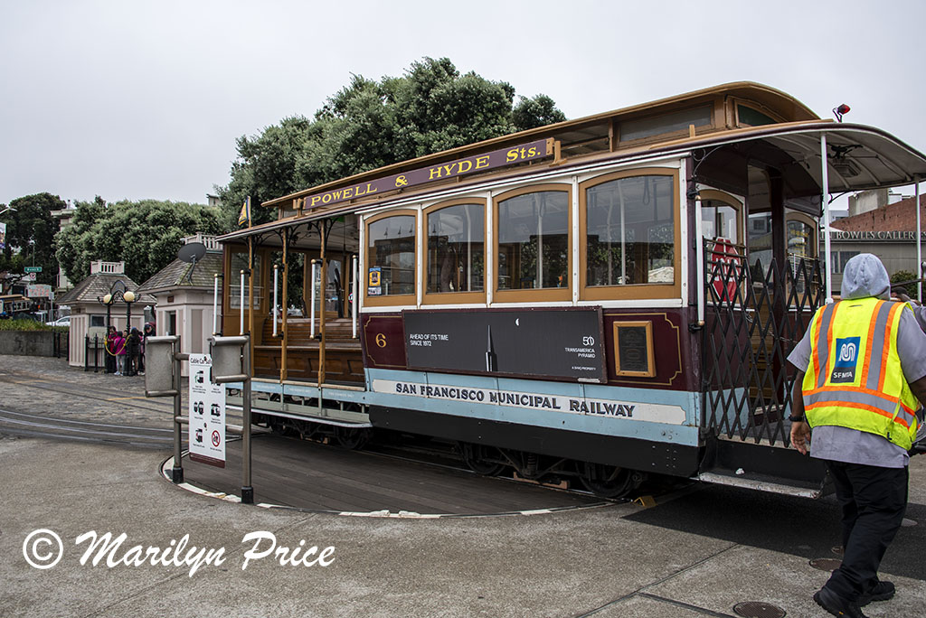 Cable car turning around on turn table (manually operated), San Francisco, CA