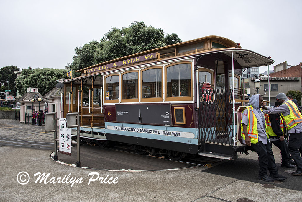 Cable car turning around on turn table (manually operated), San Francisco, CA