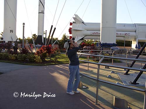 Marilyn shoots up a rocket at the Rocket Garden, Kennedy Space Center, FL