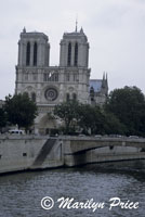 Main facade of the Cathedral of Notre Dame de Paris with the River Seine, Paris, France
