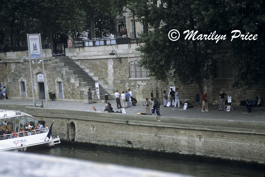 Lots of activity alone one of the banks of the Seine, Paris, France