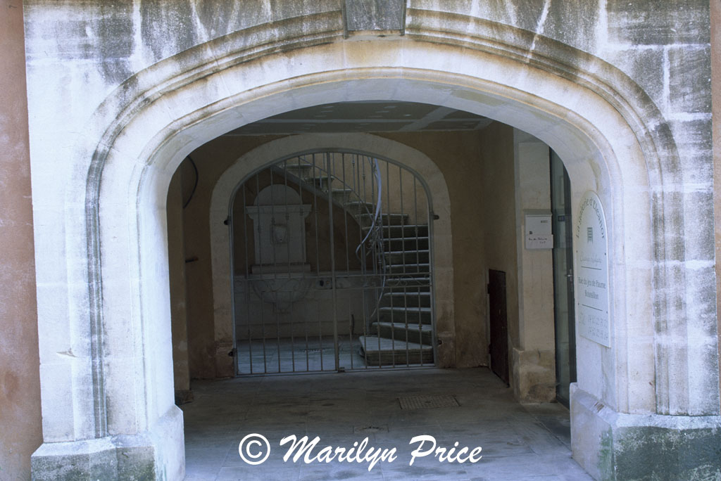 Courtyard with winding staircase, Rousillon, France