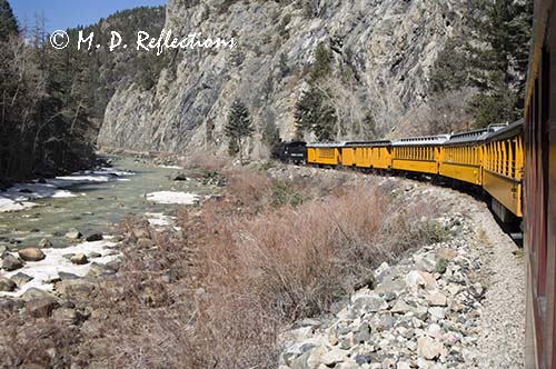 The train turns a corner near the Animas River, Durango-Silverton Narrow Gauge Railroad, Durango, CO