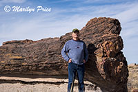 Carl emulates early photo of Albert Einstein taken next to 'Old Faithful', Giant Logs Trail, Petrified Forest National Park, AZ