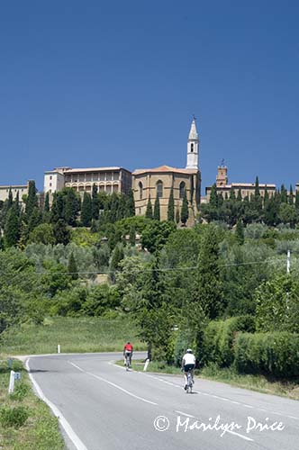 A couple of hardy bicyclists near Pienza, Tuscany, Italy