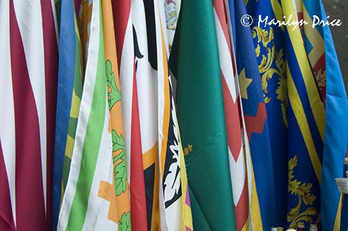 Store display of Palio flags, Siena, Tuscany, Italy