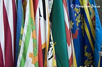 Store display of Palio flags, Siena, Tuscany, Italy
