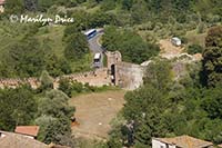Tour buses approach the city walls, Siena, Tuscany, Italy