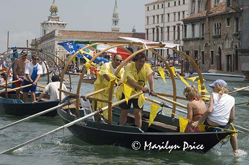 Grand Canal and parade of rowed boats, Venice, Italy