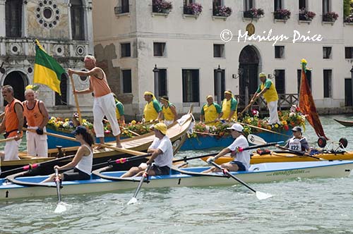 Grand Canal and parade of rowed boats, Venice, Italy