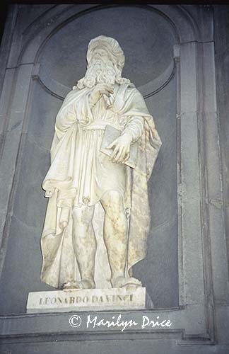 A statue of Leonardo da Vinci, Uffizi courtyard, Florence, Italy