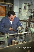 Silversmith fashioning a cup on a lathe, Florence, Italy
