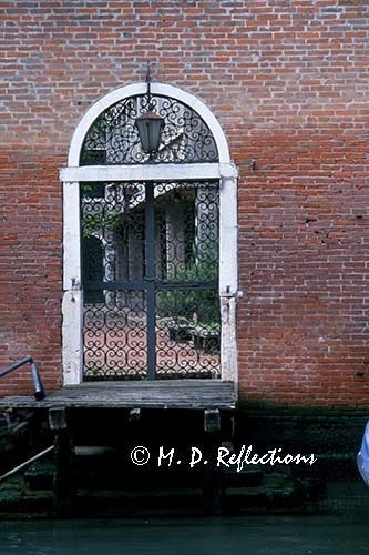 Gate to a private courtyard, Venice, Italy