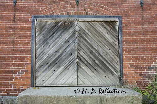 Door on a delivery dock at an old mill, Newmarket, NH