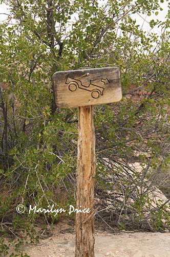 Sign pointing out the first descent, Elephant Hill jeep trail, Canyonlands National Park, UT