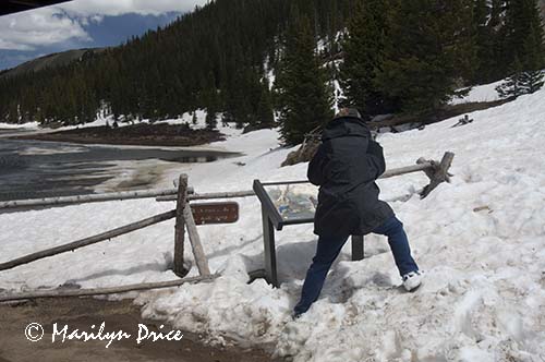 Carl takes a picture of an information sign at Poudre Lake, Rocky Mountain National Park, CO