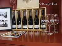 Wine glasses and bottles in the tasting room, Sokol Blosser Winery, OR