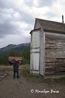 Joan and abandoned buildings, Ironton, CO