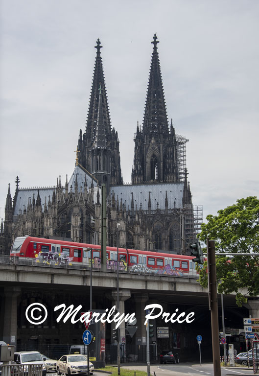 Cologne Cathedral and train, Cologne, Germany