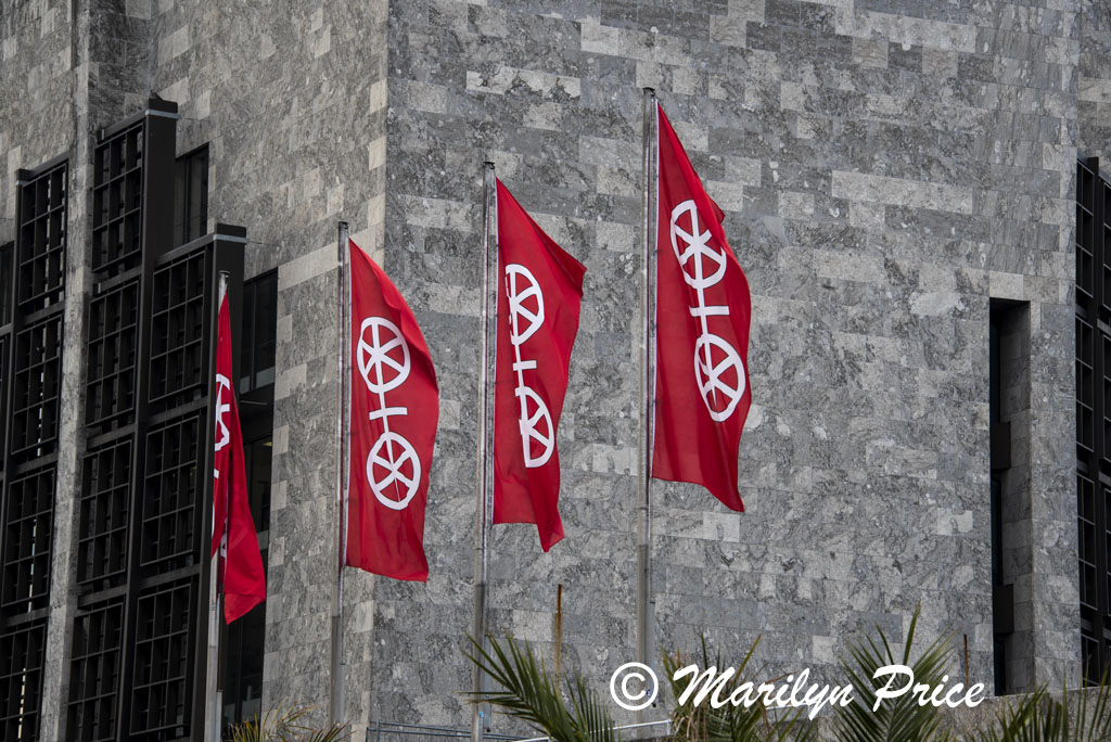 Flags show symbol of the city - a pair of wheels, Mainz, Germany