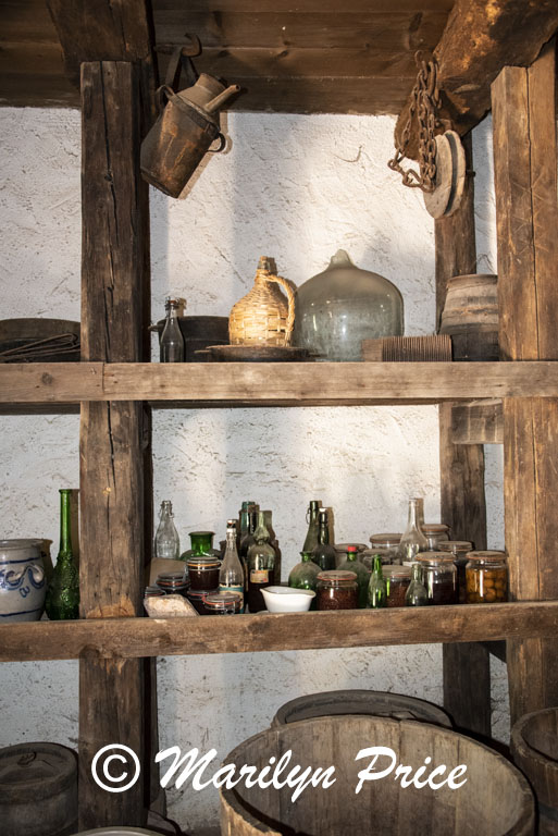 Old bottles in the storage area of a farmhouse, Open Air Museum, Black Forest, Germany