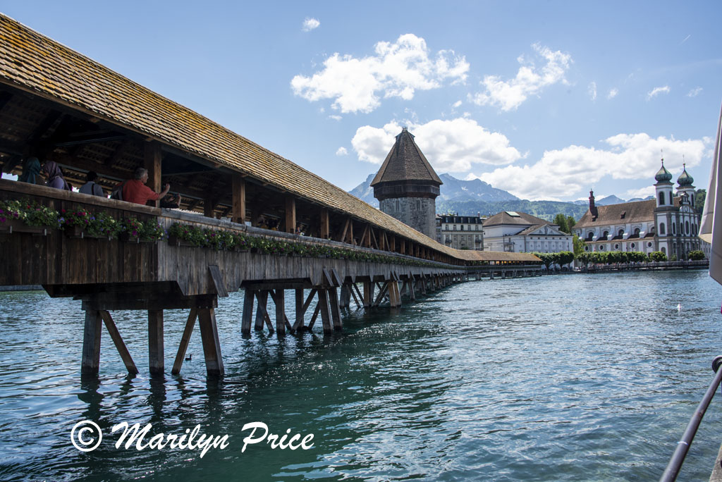 Chapel Bridge, long wooden bridge that was part of the city fortifications, Lucerne, Switzerland