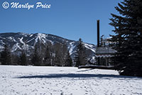 Playground equipment that looks like a riverboat with the ski area in the background, West Lincoln Park, Steamboat Springs, CO