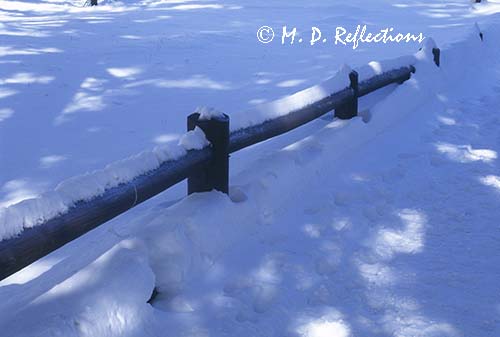 Snow covered fence, Bryce Canyon National Park, UT