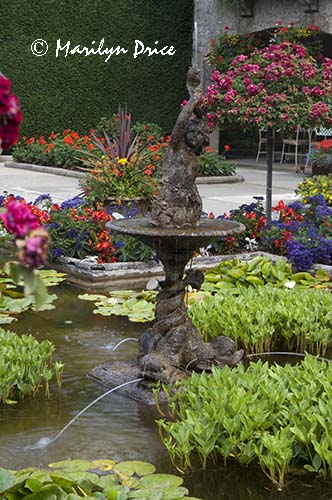Statue of a girl holding a fish, Italian Gardens, Butchart Gardens, Victoria, BC