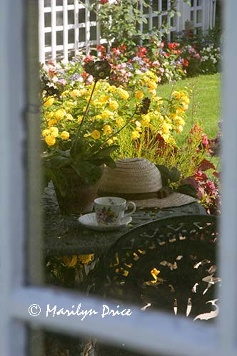 Ready for a tea break after gardening, Garden House of private garden, Butchart Gardens, Victoria, BC