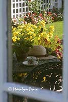 Ready for a tea break after gardening, Garden House of private garden, Butchart Gardens, Victoria, BC