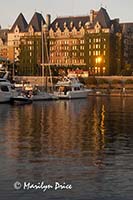 The Empress Hotel reflecting in the waters of the harbor, Victoria, BC
