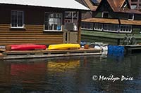 Kayaks and a bicycle on houseboats, Fisherman's Wharf, Victoria, BC
