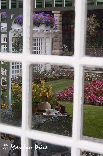 Ready for a tea break after gardening, Garden House of private garden, Butchart Gardens, Victoria, BC